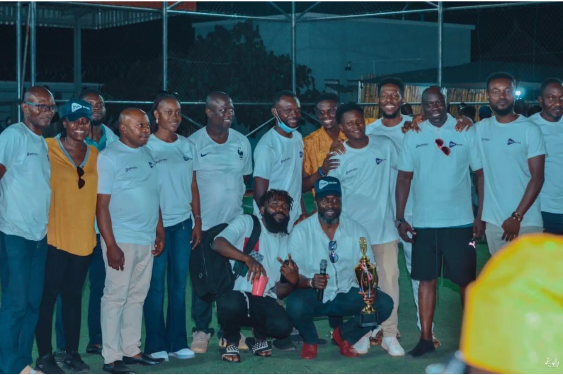 Croc City Soccer League team posing with a trophy after the match
