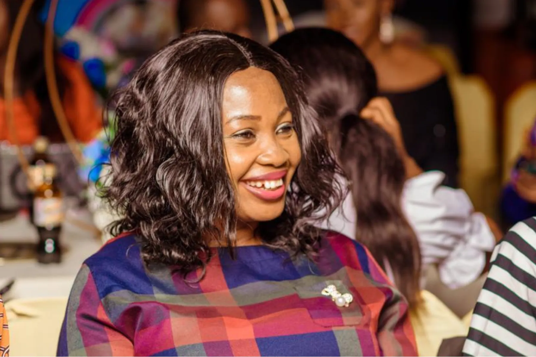 Kaduna Laffs attendee smiling at the comedy event